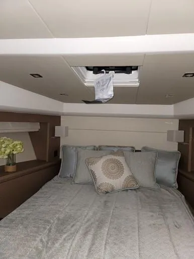 Slide: The Image of Luxurious bedroom on a 2016 Prestige 560 yacht. - 32