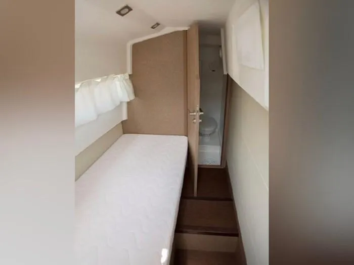 Slide: The Image of Interior of a 2016 Prestige 560 yacht with bed and bathroom. - 36