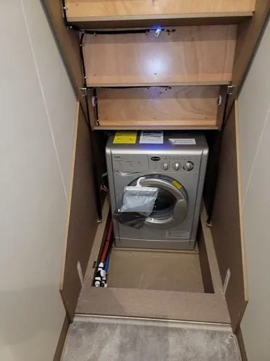 Slide: The Image of Washing machine in a 2016 Prestige 560 motorhome. - 38