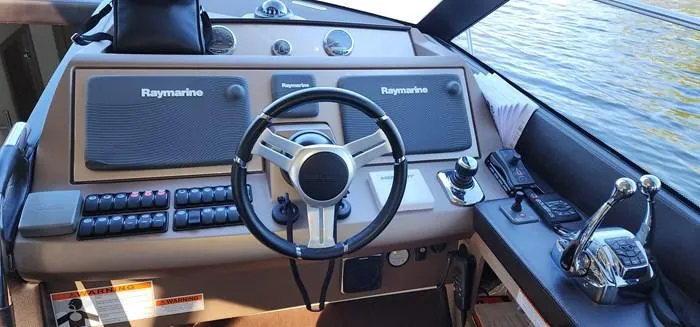 Slide: The Image of Helm of a 2016 Prestige 560 yacht with Raymarine equipment. - 4