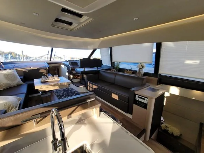 Slide: The Image of Luxurious interior of a 2016 Prestige 560 yacht. - 7