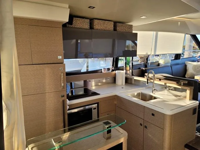Slide: The Image of Modern kitchen on a 2016 Prestige 560 yacht. - 9