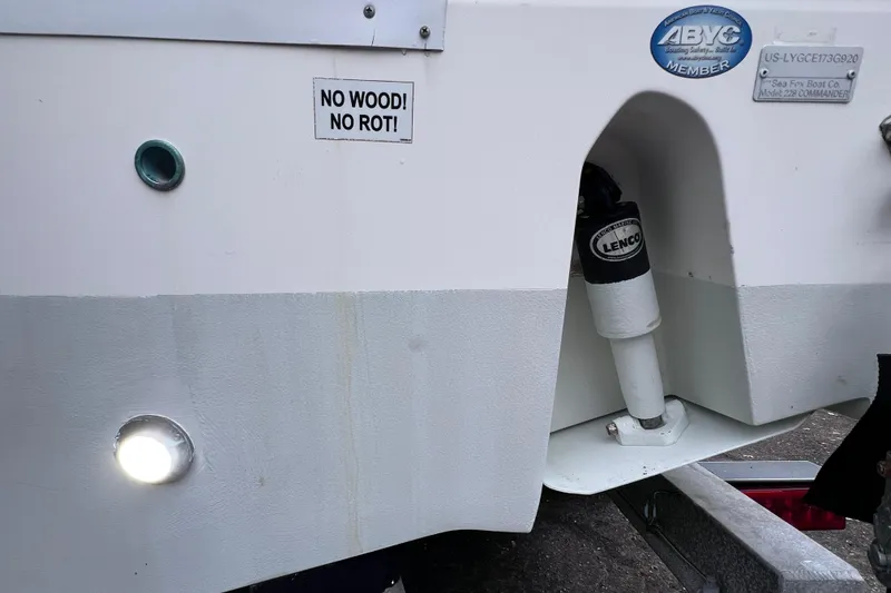 Slide: The Image of 2020 Sea Fox 228 Commander boat stern with "No Wood! No Rot!" sign. - 10