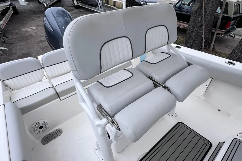Slide: The Image of 2020 Sea Fox 228 Commander boat interior with cushioned seating and helm station. - 20