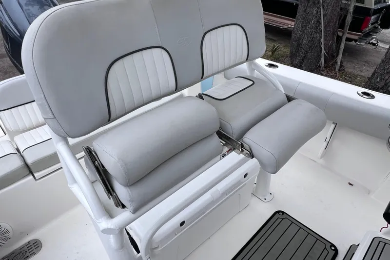 Slide: The Image of 2020 Sea Fox 228 Commander boat seating with cushioned backrest and armrests. - 21
