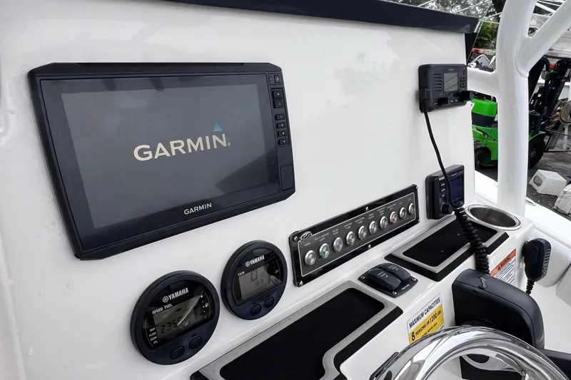 Slide: The Image of Control panel of 2020 Sea Fox 228 Commander with Garmin display and Yamaha gauges. - 25