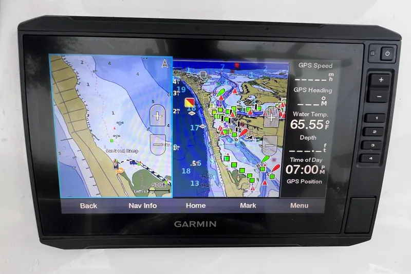 Slide: The Image of Garmin GPS display on 2020 Sea Fox 228 Commander, showing navigation and water temperature. - 28