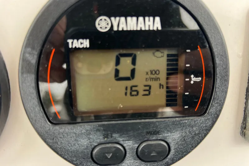 Slide: The Image of Yamaha tachometer displaying 163 hours on a 2020 Sea Fox 228 Commander boat. - 31