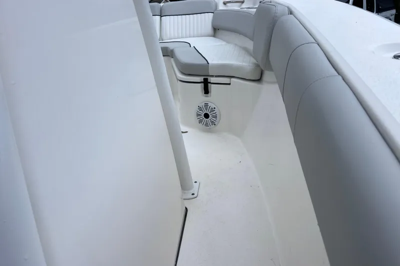 Slide: The Image of 2020 Sea Fox 228 Commander boat interior with cushioned seating and speaker. - 33