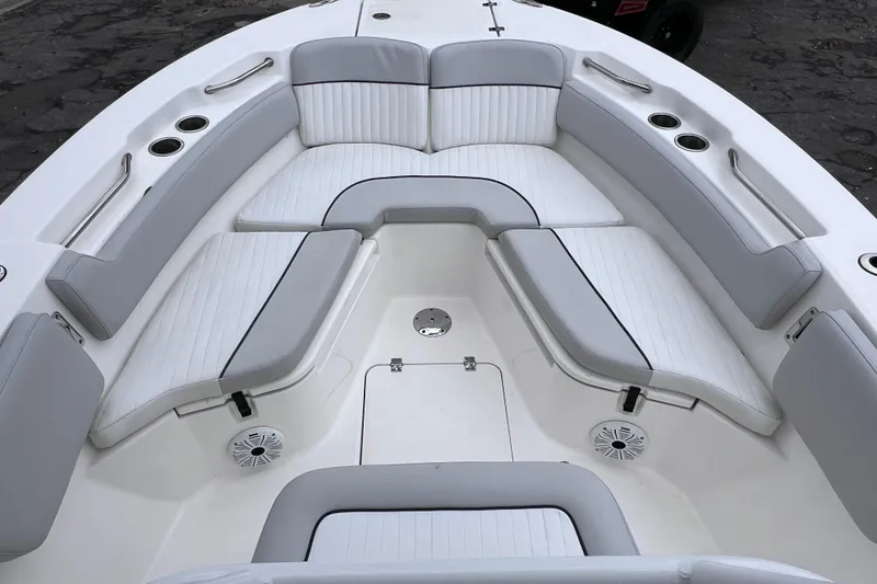 Slide: The Image of 2020 Sea Fox 228 Commander boat interior with cushioned seating and cup holders. - 36