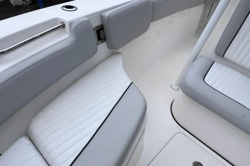 Slide: The Image of 2020 Sea Fox 228 Commander boat interior with cushioned seating and sleek design. - 39