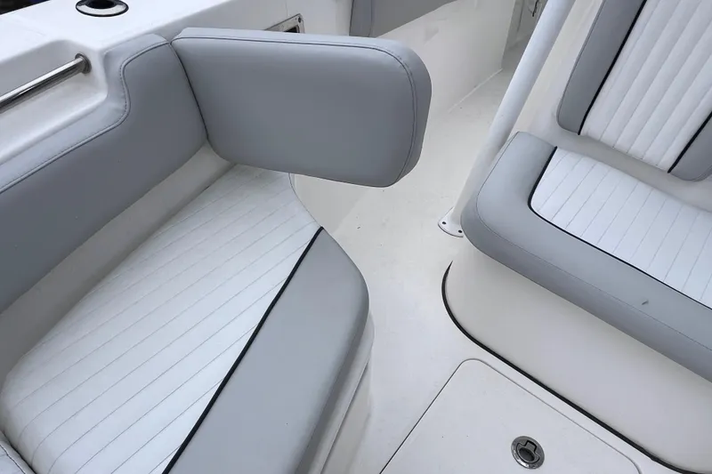 Slide: The Image of Interior seating of 2020 Sea Fox 228 Commander boat, featuring white and gray upholstery. - 40