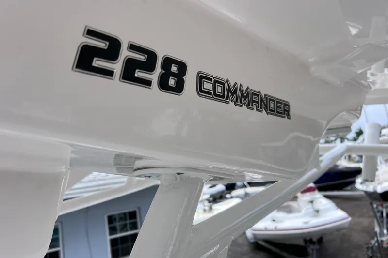 Slide: The Image of Close-up of 2020 Sea Fox 228 Commander boat logo on white hull. - 44