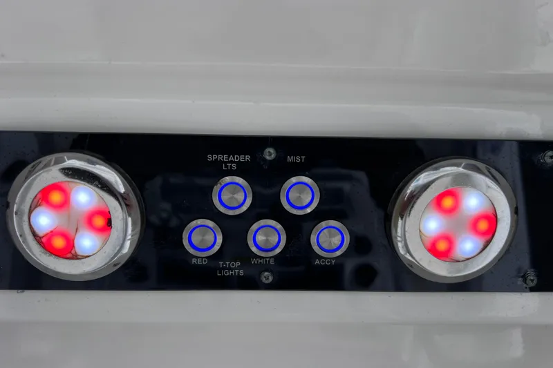 Slide: The Image of Control panel of 2020 Sea Fox 228 Commander boat with illuminated buttons and lights. - 47