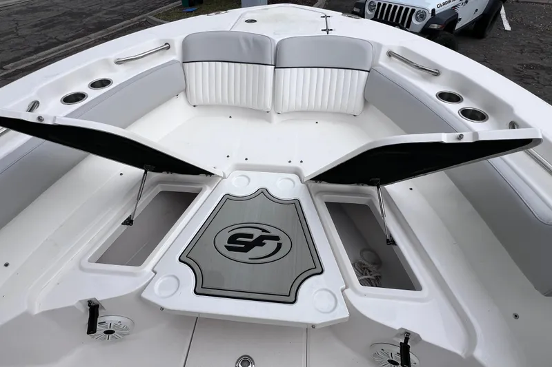 Slide: The Image of 2020 Sea Fox 228 Commander boat interior with open storage compartments and seating. - 54
