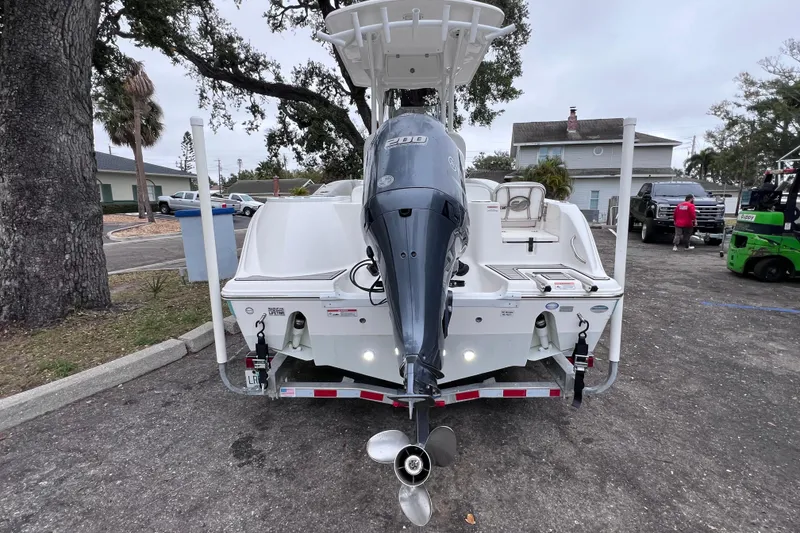 Slide: The Image of 2020 Sea Fox 228 Commander boat with outboard motor, parked on a trailer. - 8