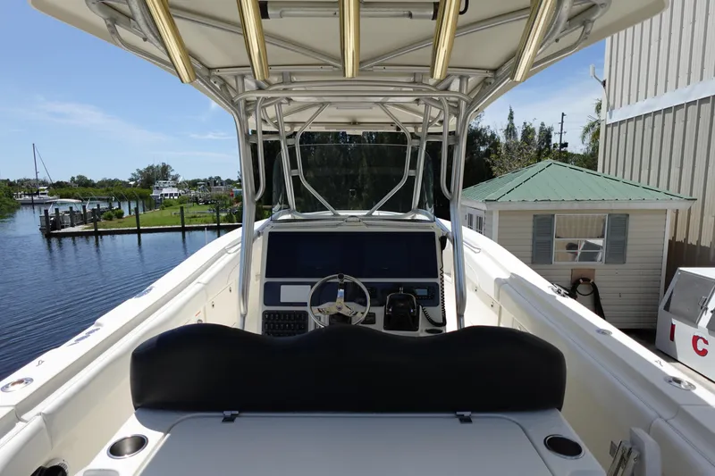 Slide: The Image of 2005 Hydra-Sports Vector 3300 CC boat interior with helm and waterfront view. - 27