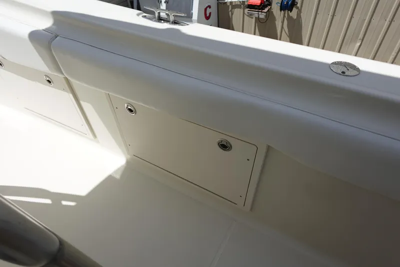 Slide: The Image of 2005 Hydra-Sports Vector 3300 CC boat interior, featuring storage compartments and sleek design. - 37
