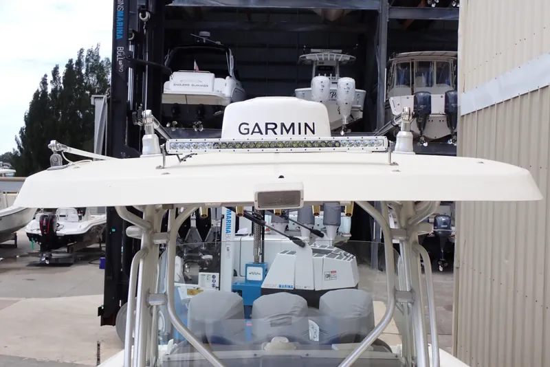 Slide: The Image of 2005 Hydra-Sports Vector 3300 CC with Garmin equipment in a marina storage. - 9