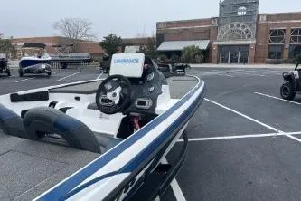 Slide: The Image of 2015 Nitro Z-7 boat with Lowrance system in a parking lot. - 3