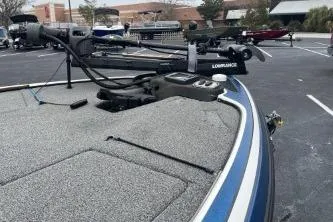 Slide: The Image of 2015 Nitro Z-7 boat with Lowrance equipment in a parking lot. - 5