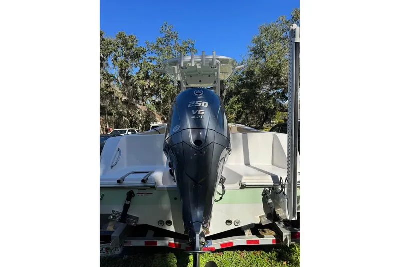 Slide: The Image of 2022 Sportsman Heritage 231 Center Console boat with powerful 250 V6 engine. - 4