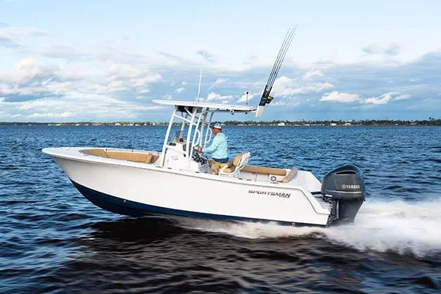 Slide: The Image of Manufacturer Provided Image: 2022 Sportsman Heritage 231 Center Console boat cruising on open water. - 9