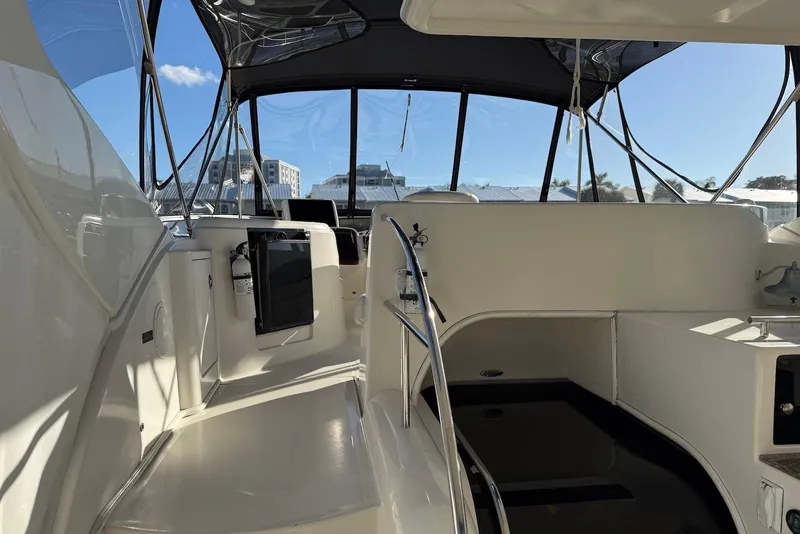 Slide: The Image of Interior view of a 2005 Meridian 459 Motoryacht, featuring spacious seating and modern design. - 11