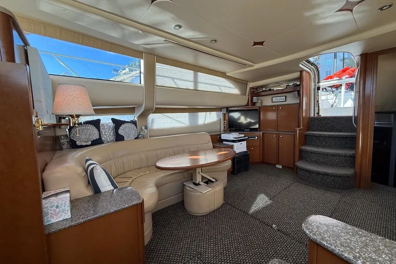 Slide: The Image of Luxurious interior of 2005 Meridian 459 Motoryacht with plush seating and elegant decor. - 21