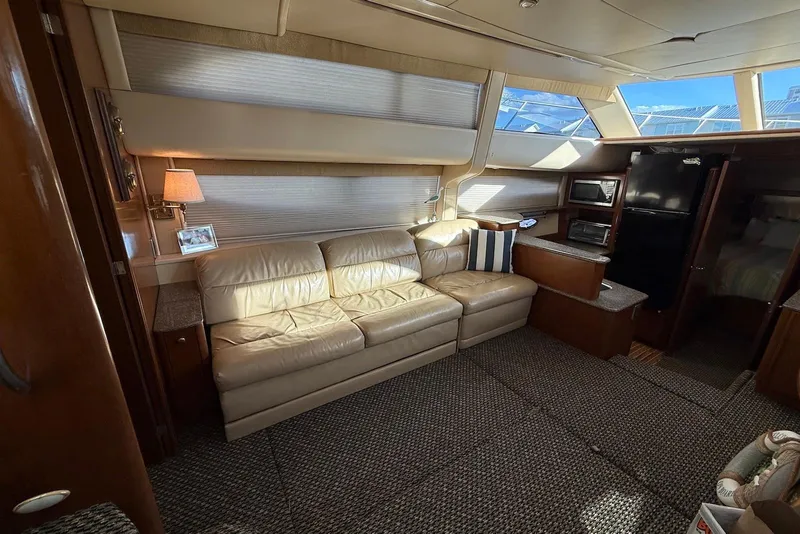 Slide: The Image of Luxurious interior of 2005 Meridian 459 Motoryacht with leather sofa and modern amenities. - 24