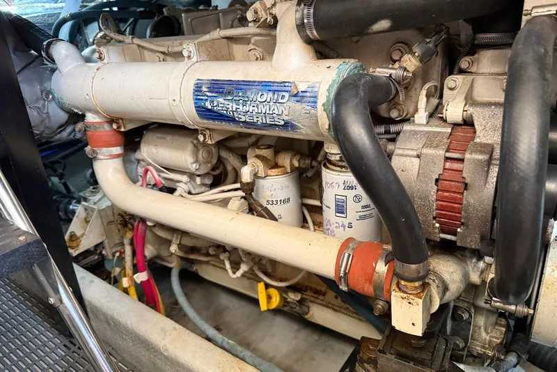 Slide: The Image of Engine compartment of a 2005 Meridian 459 Motoryacht, showcasing mechanical components. - 40