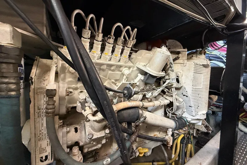 Slide: The Image of Engine compartment of a 2005 Meridian 459 Motoryacht, showcasing intricate mechanical components. - 41