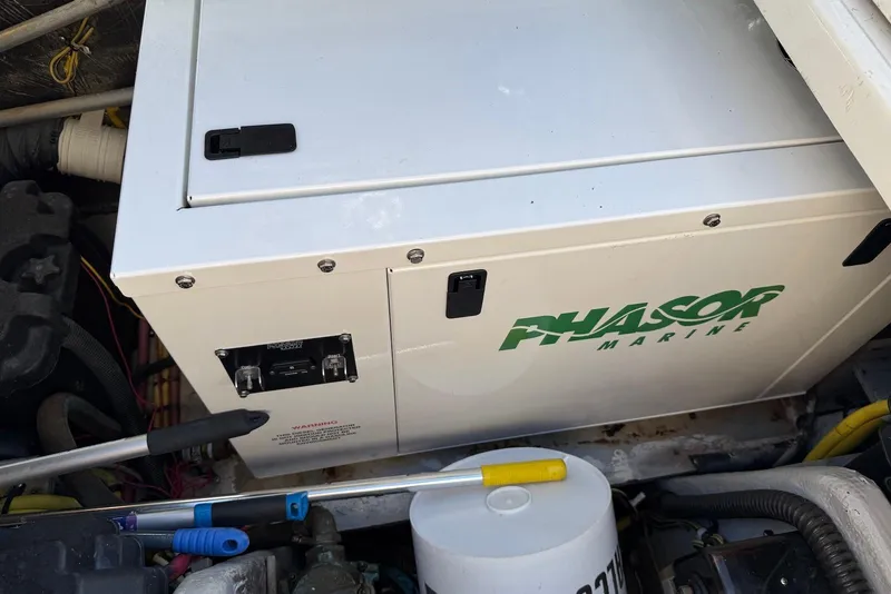 Slide: The Image of Phasor Marine generator in 2005 Meridian 459 Motoryacht engine room. - 47