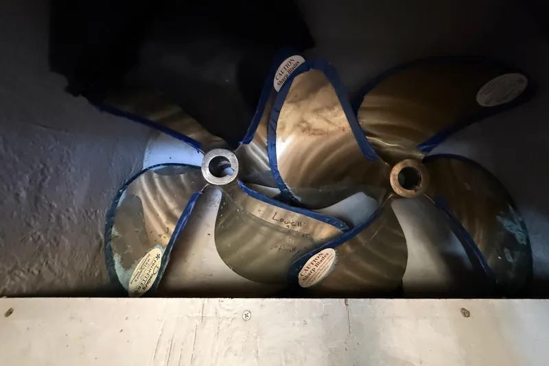 Slide: The Image of Propellers of a 2005 Meridian 459 Motoryacht, stored in a compartment. - 50