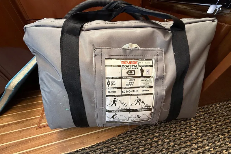 Slide: The Image of Gray Revere Coastal Commander life raft bag on a 2005 Meridian 459 Motoryacht. - 51