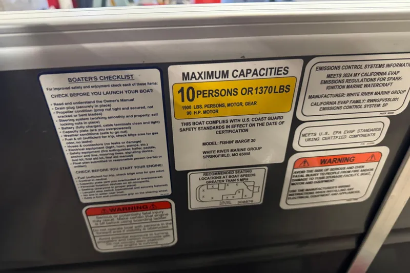 Slide: The Image of 2024 Sun Tracker Fishin' Barge 20 DLX capacity and safety labels, including boater's checklist. - 17