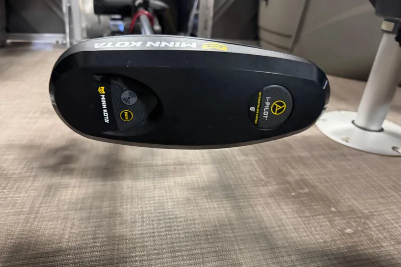 Slide: The Image of Minn Kota i-Pilot trolling motor on 2024 Sun Tracker Fishin' Barge 20 DLX boat. - 7