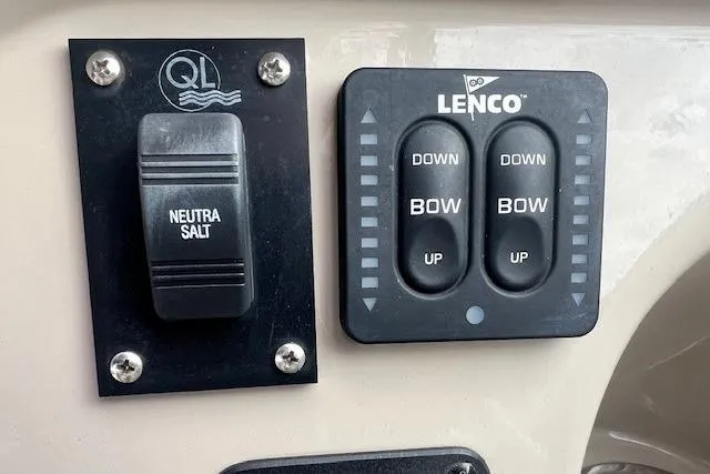Slide: The Image of Control panel of a 2006 Sea Ray Sundancer 260 with Neutra Salt and Lenco switches. - 10