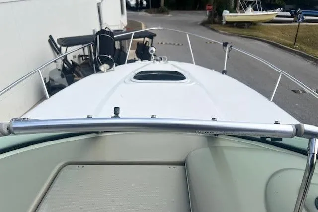 Slide: The Image of 2006 Sea Ray Sundancer 260 boat deck view, featuring sleek design and spacious layout. - 12