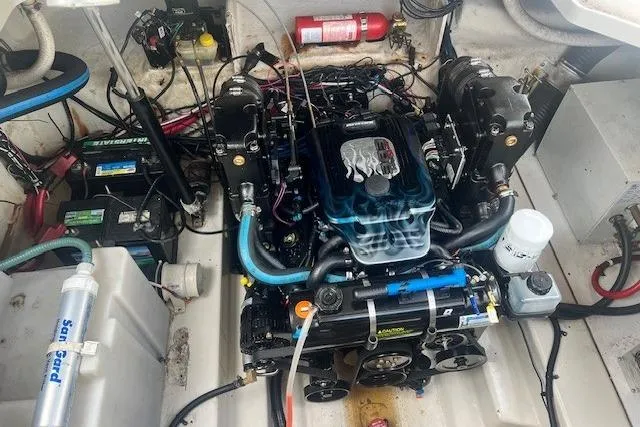 Slide: The Image of Engine compartment of a 2006 Sea Ray Sundancer 260 boat, featuring detailed components. - 16