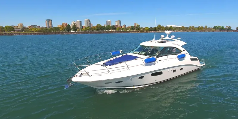 Slide: The Image of 2011 Sea Ray 470 Sundancer yacht cruising on a sunny day. - 12