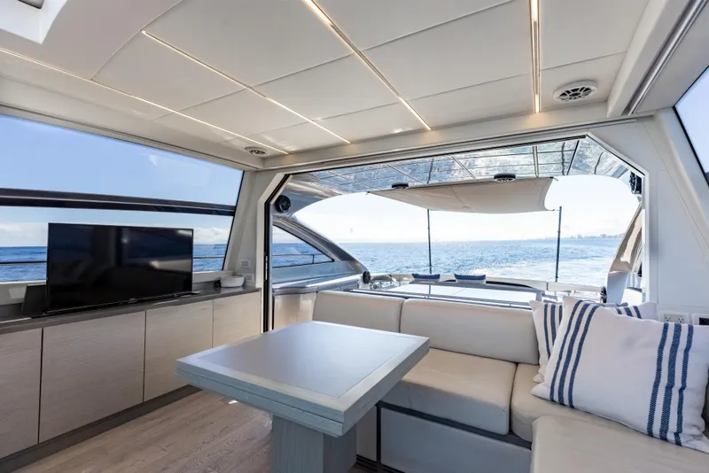 Slide: The Image of Luxurious interior of 2016 Pershing 62 yacht with ocean view and modern amenities. - 16