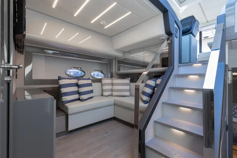 Slide: The Image of Luxurious interior of 2016 Pershing 62 yacht with modern seating and elegant lighting. - 20