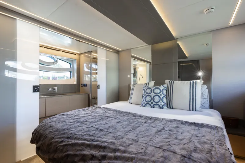 Slide: The Image of Luxurious bedroom interior of 2016 Pershing 62 yacht with modern design and elegant decor. - 24