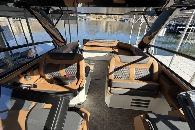 Slide: The Image of Luxurious interior of 2025 Cobalt R35 boat with elegant seating and waterfront view. - 10