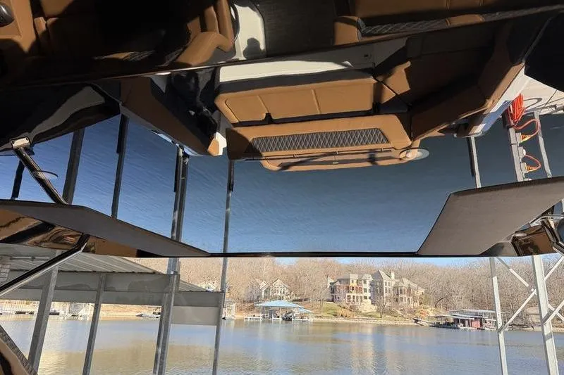 Slide: The Image of 2025 Cobalt R35 boat interior with lake view, featuring luxurious seating and modern design. - 32