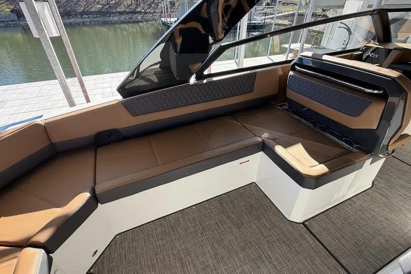 Slide: The Image of Luxurious interior of 2025 Cobalt R35 boat with brown seating and modern design. - 8