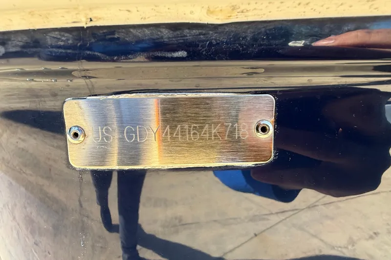 Slide: The Image of 2018 Hurricane SunDeck 2486 OB boat hull identification number plate. - 11