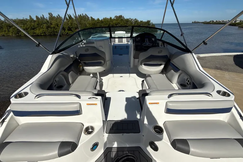 Slide: The Image of 2018 Hurricane SunDeck 2486 OB boat interior with spacious seating and sleek design. - 21