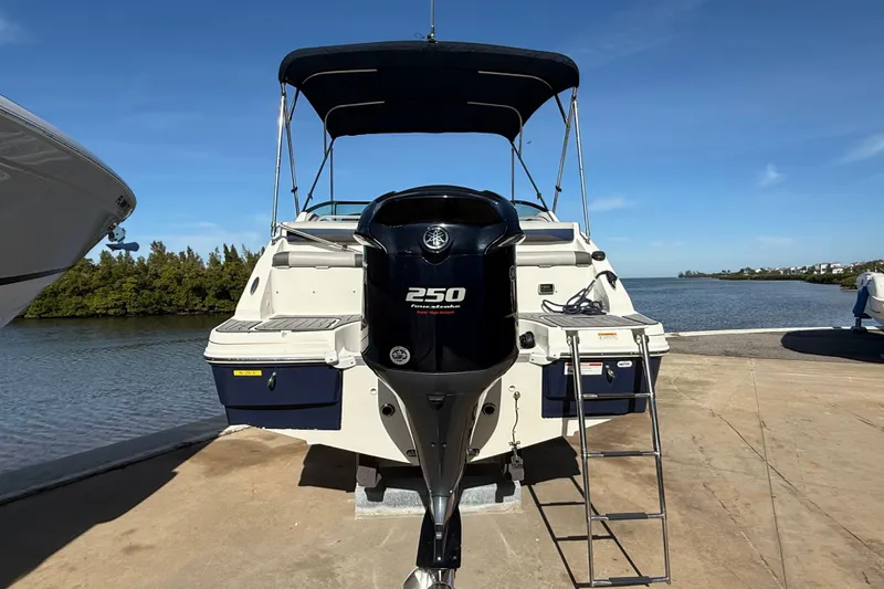 Slide: The Image of 2018 Hurricane SunDeck 2486 OB boat with 250 horsepower engine at dockside. - 3